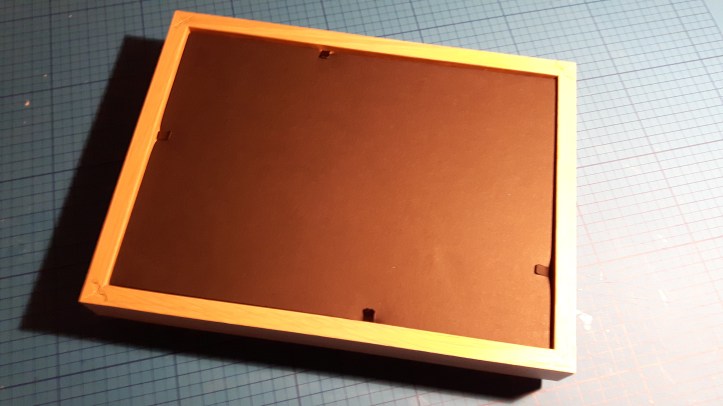 Fixe o fundo do porta-retrato