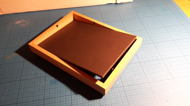 Remova a parte interna do porta-retrato