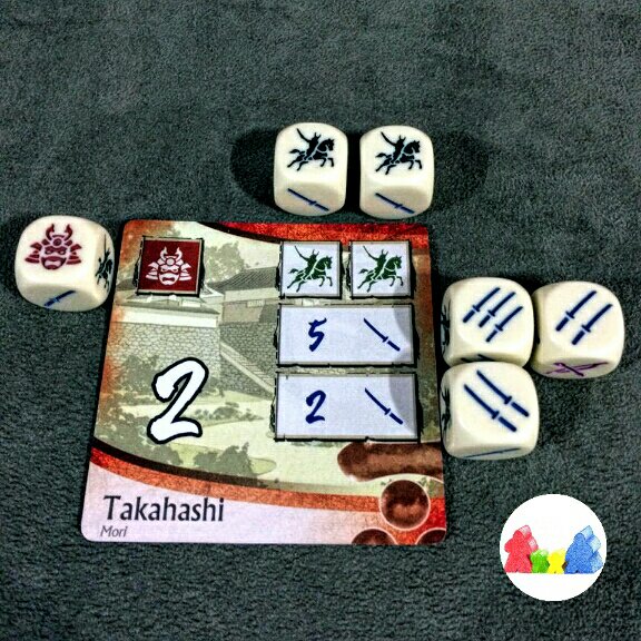 Castelo sendo roubado do seu dono no jogo de tabuleiro Age of War