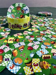 A simpática latinha do jogo infantil Picnic