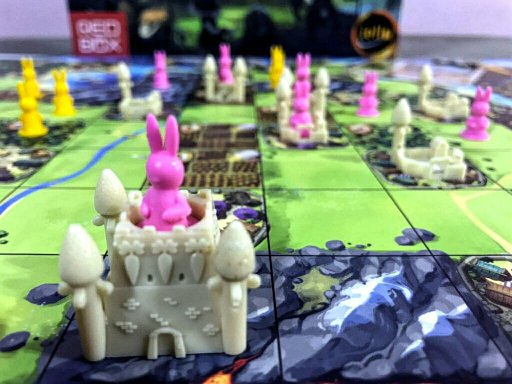 Cidades com três torres no jogo de tabuleiro Bunny Kingdom