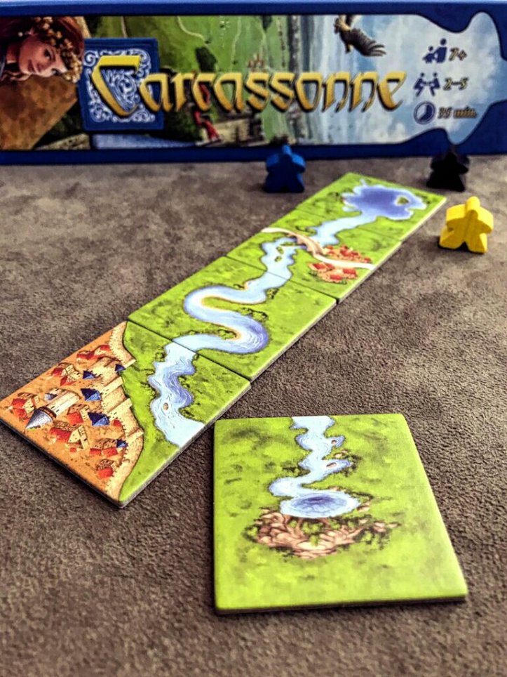 Mini expansão Rio no jogo de tabuleiro Carcassonne